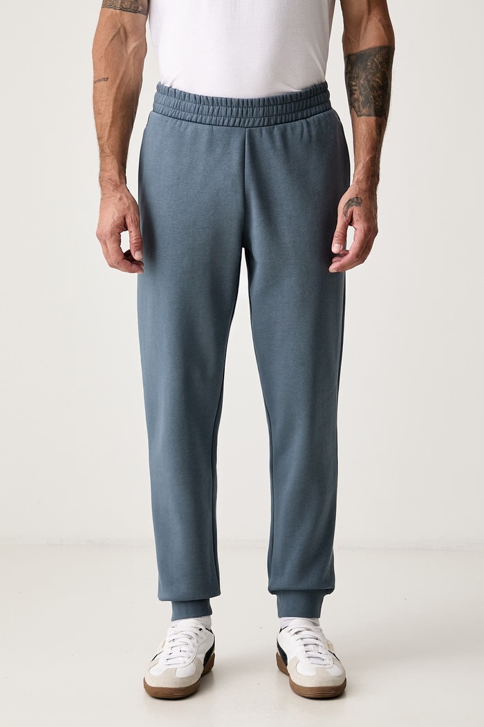 Puma Spodnie dresowe męskie z bawełną Essential Logo niebieski 682607