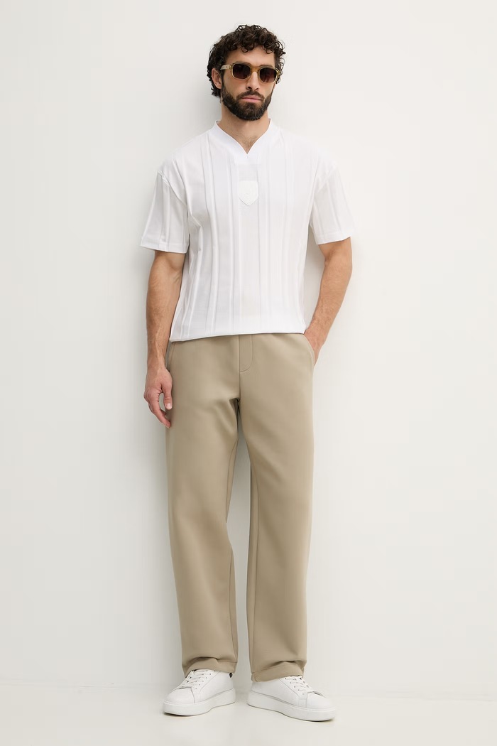 Armani Exchange spodnie dresowe męskie z bawełną XM001890.AF10818 beżowy SS26