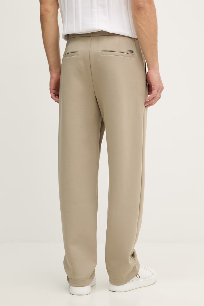 Odzież Armani Exchange spodnie dresowe męskie z bawełną XM001890.AF10818 beżowy