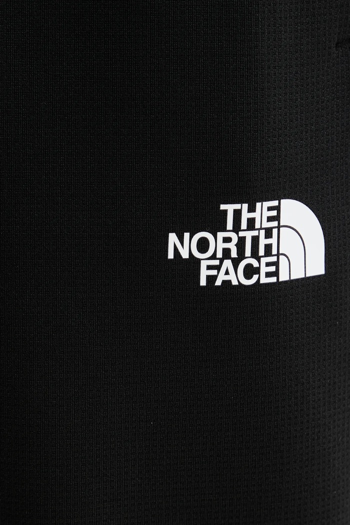 Tepláky The North Face Reaxion 2.0 černá NF0A8DRSKS71