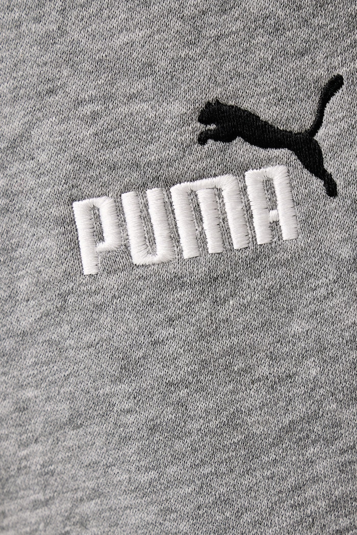 Oblečenie Puma Teplákové nohavice pánske s bavlnou Essential Logo 684713 sivá