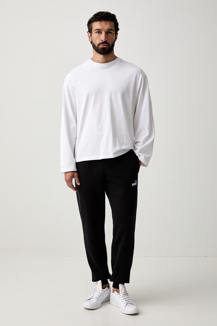 Puma spodnie dresowe męskie z bawełną Essential Logo 684713 czarny AW25