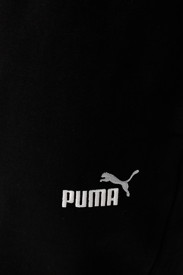 Puma spodnie dresowe męskie z bawełną Essential Logo czarny 684713