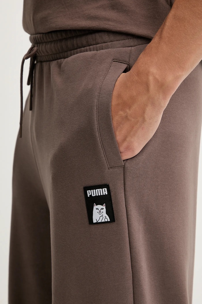 Spodnji del trenirke Puma PUMA x RIPNDIP rjava 632416