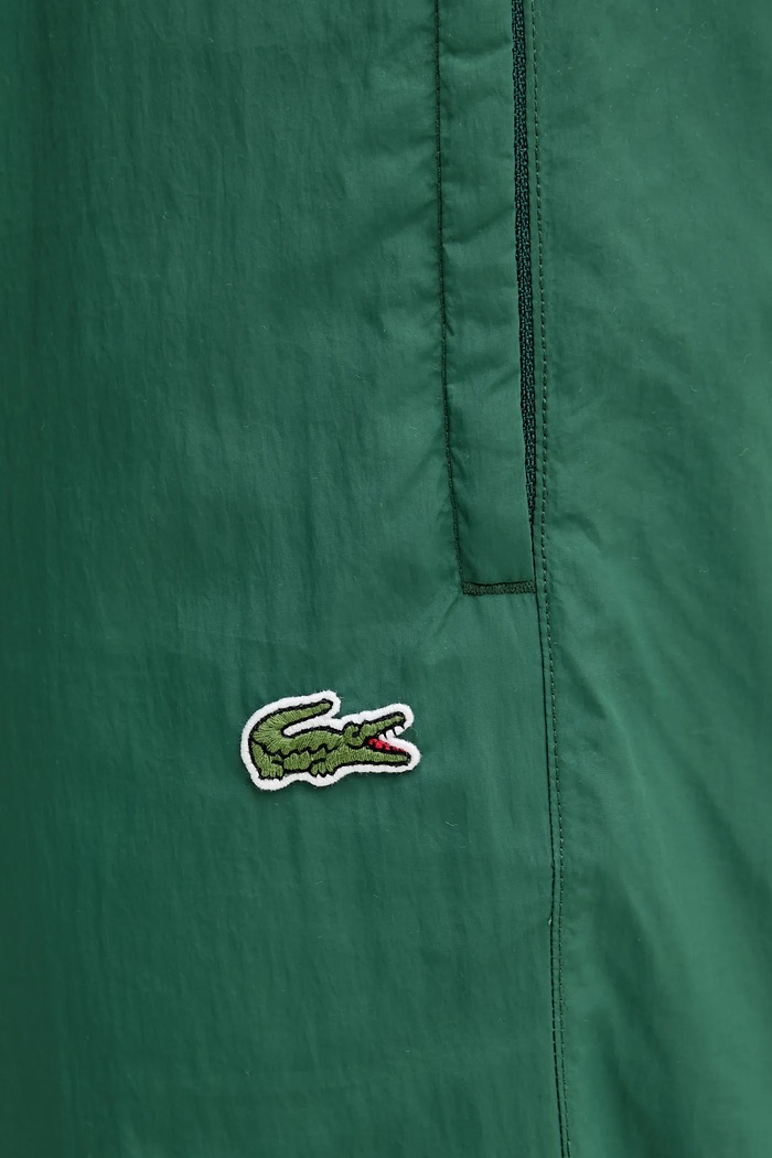 Tepláky Lacoste zelená XH8909