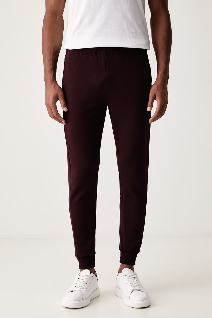 Lacoste Spodnie dresowe męskie z bawełną bordowy XH9583