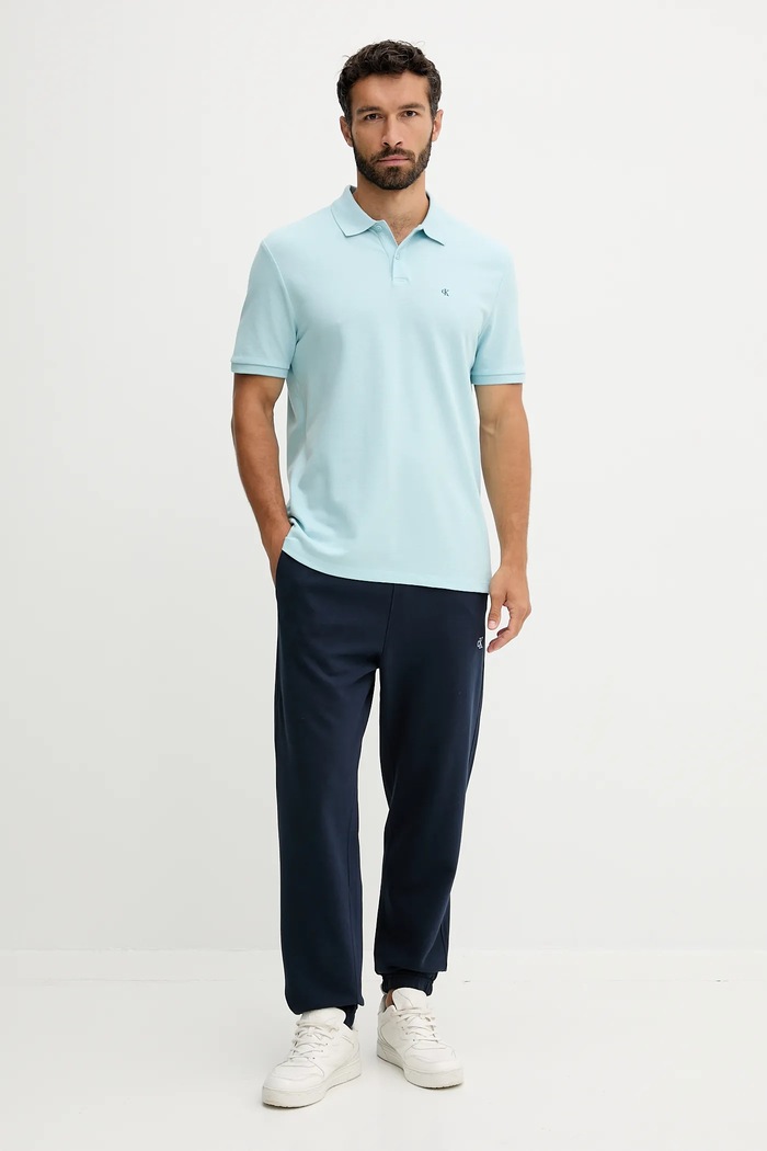 Calvin Klein Jeans spodnie dresowe bawełniane LV04RD241G granatowy SS26