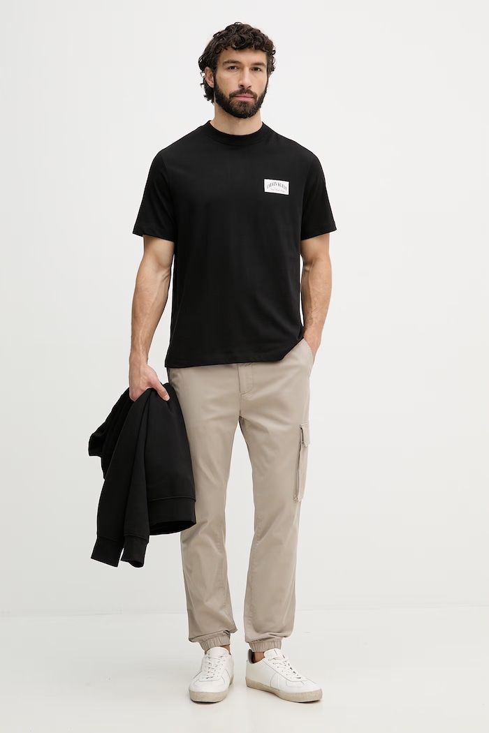 Calvin Klein Jeans nohavice cargo pánske bavlnené s elastanom LV04RD608G béžová SS26