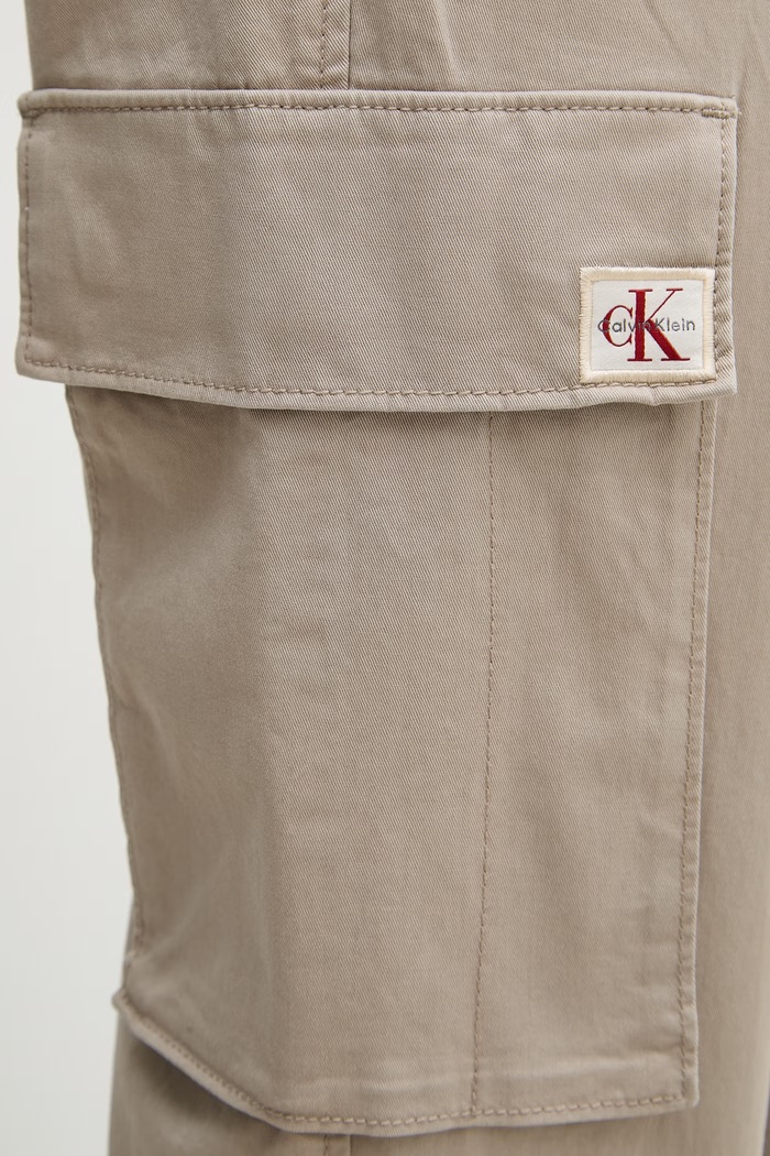 Calvin Klein Jeans nohavice cargo pánske bavlnené s elastanom béžová LV04RD608G