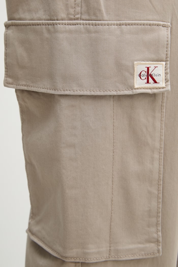 Calvin Klein Jeans nohavice cargo pánske bavlnené s elastanom béžová LV04RD608G