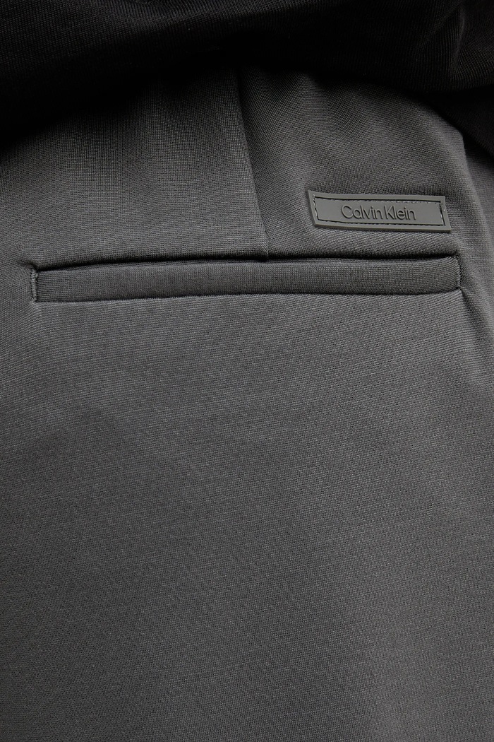 Nohavice Calvin Klein sivá LV04LE613G