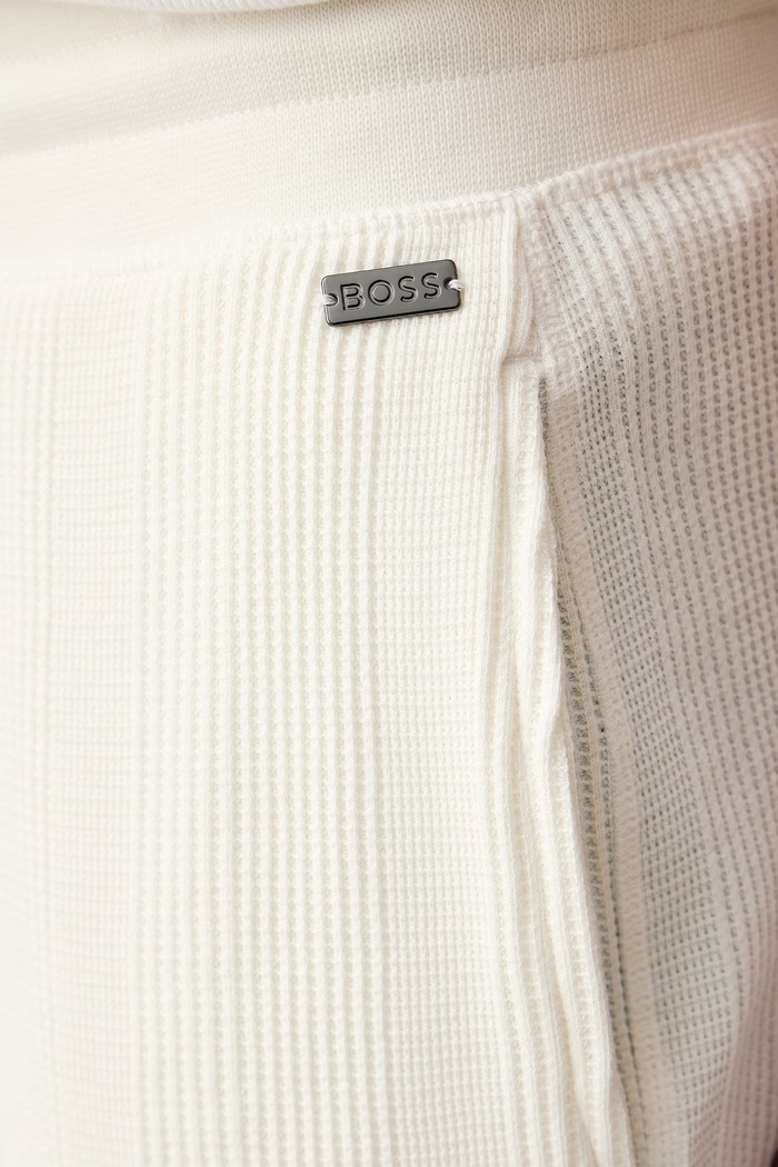 Loungewear hlače moške z bombažem Structure Pants BOSS 50540577 bež
