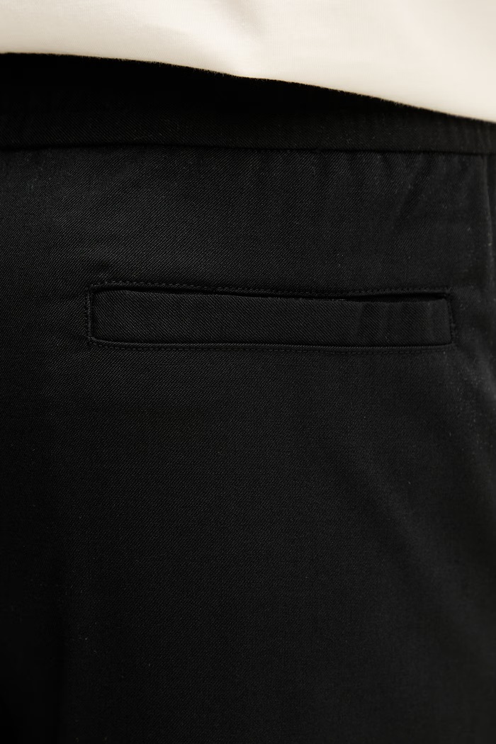 Filling Pieces pantaloni de lână Coach Twill Wool 422550500247 negru