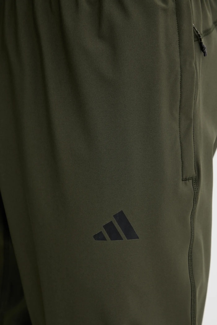 adidas Performance spodnie treningowe Tr-Es Woven zielony KA7859