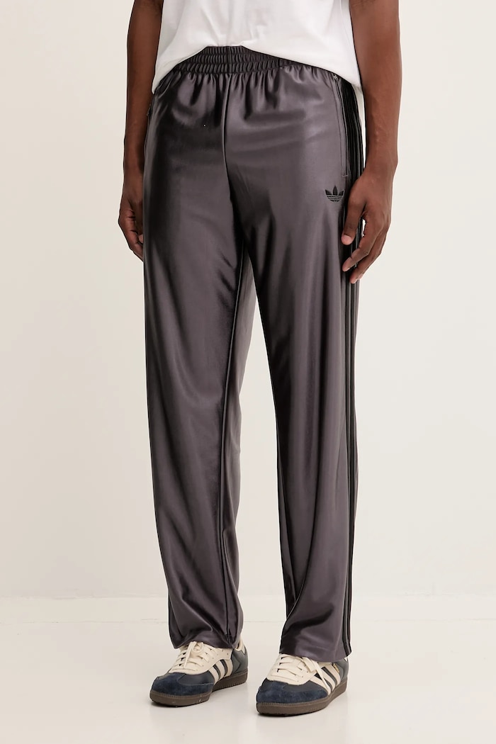 adidas Originals spodnie dresowe Firebird Tp dzianina fioletowy JW5959