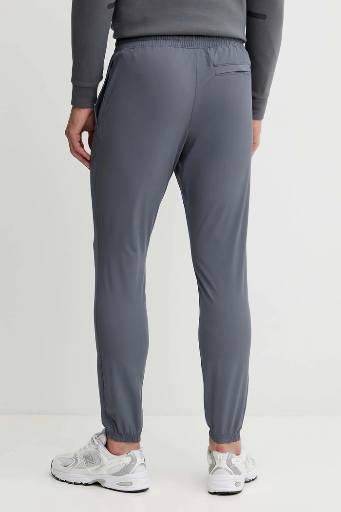 Дрехи Спортен панталон Under Armour Vibe Woven 1386557 сив