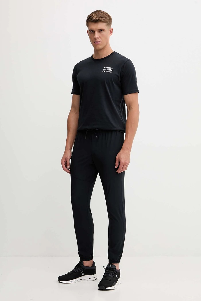 Donji dio trenirke Under Armour Vibe Woven 1386557 crna AW25