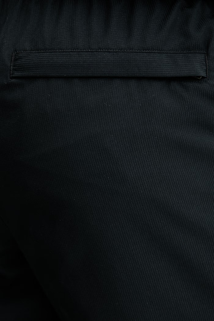 Under Armour spodnie dresowe 1390150 czarny