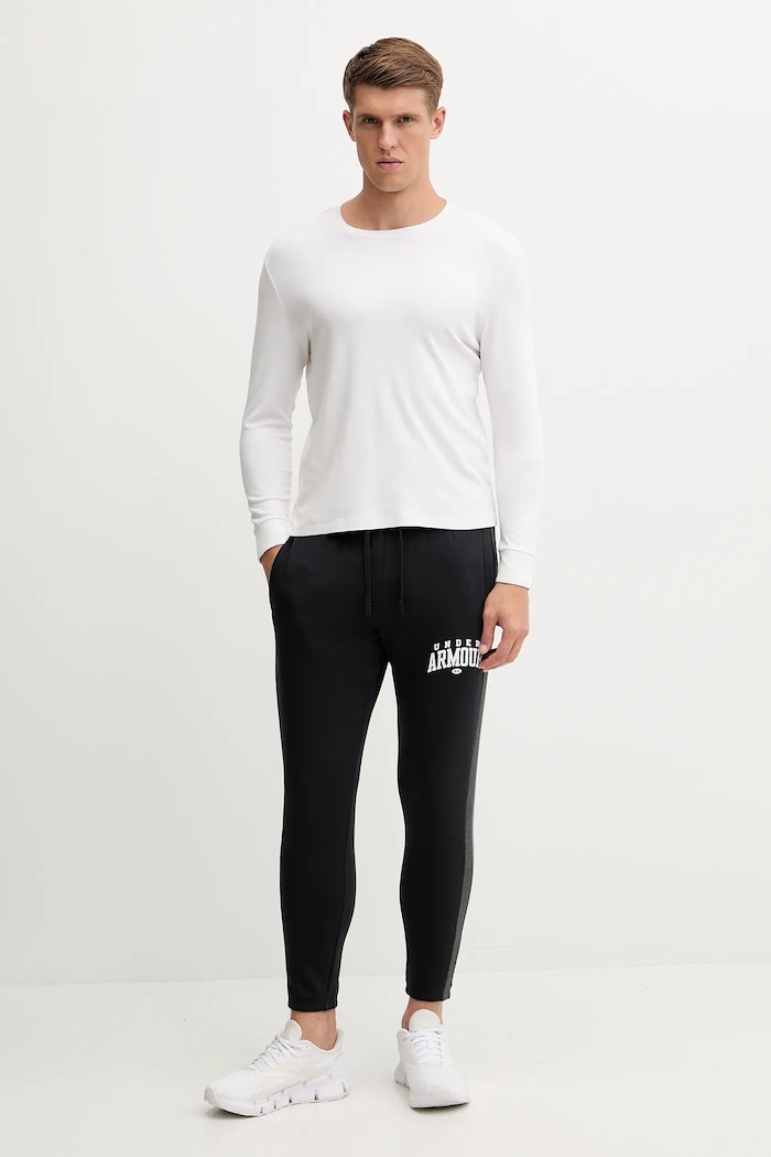 Spodnji del trenirke Under Armour Rival 6003954 črna AW25