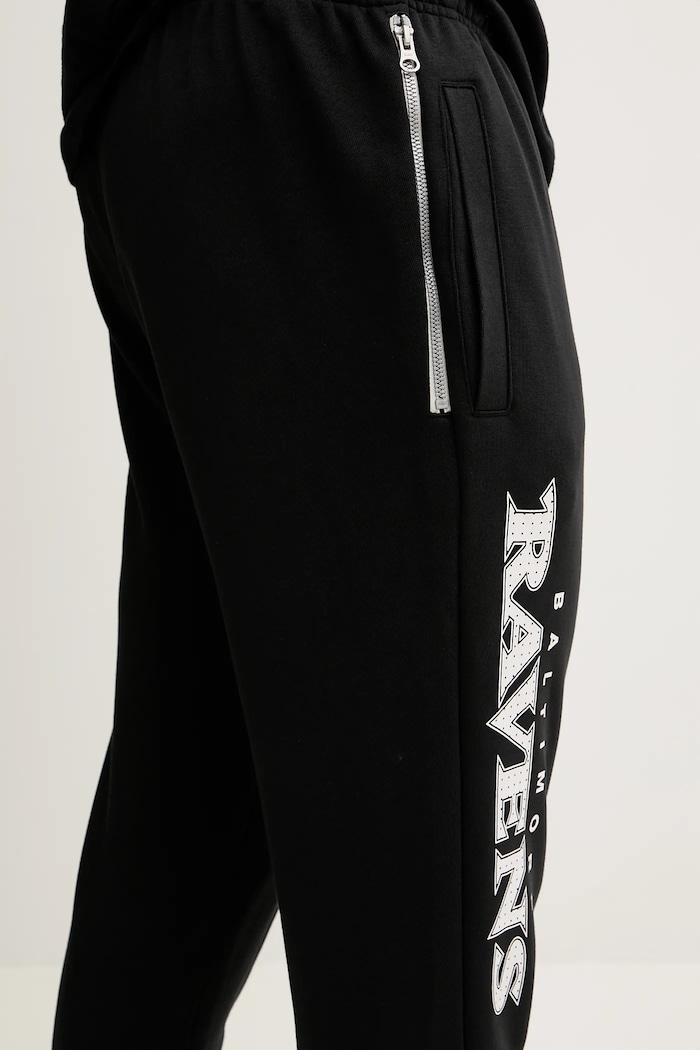 Nike pantaloni de trening Dri-Fit SI Taper Pant negru 03B0.00A.8G.JK2