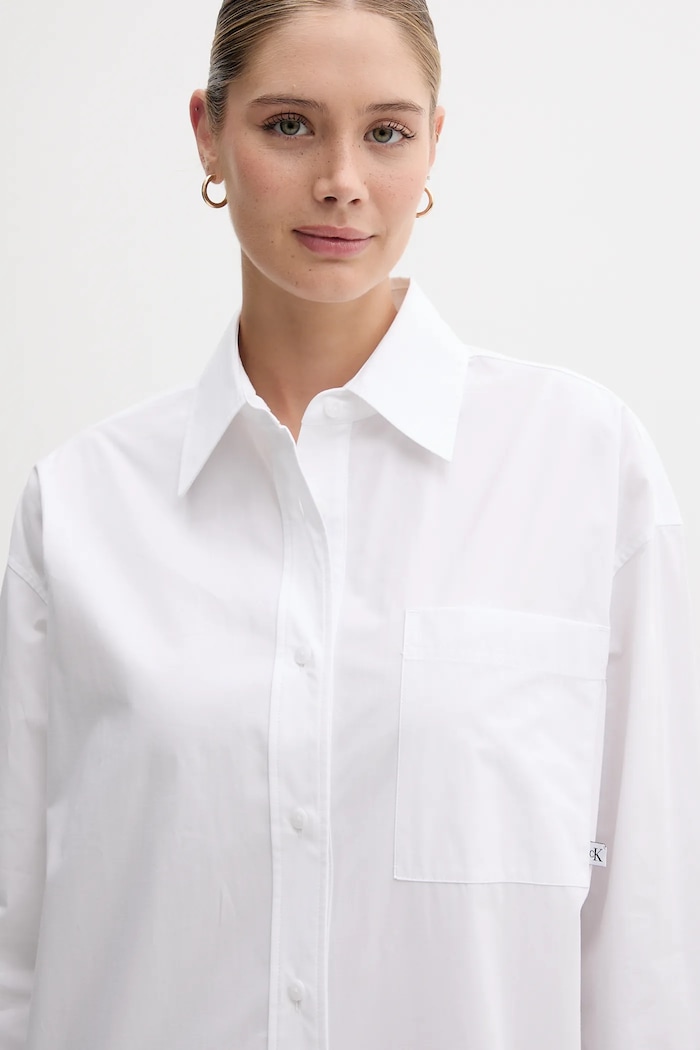 Bavlněné šaty Calvin Klein Jeans bílá LV047C022G