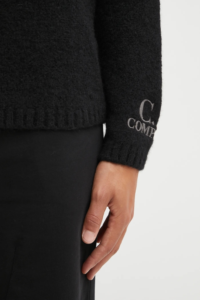 C.P. Company maglione con lana 19CMKN281A110509A nero