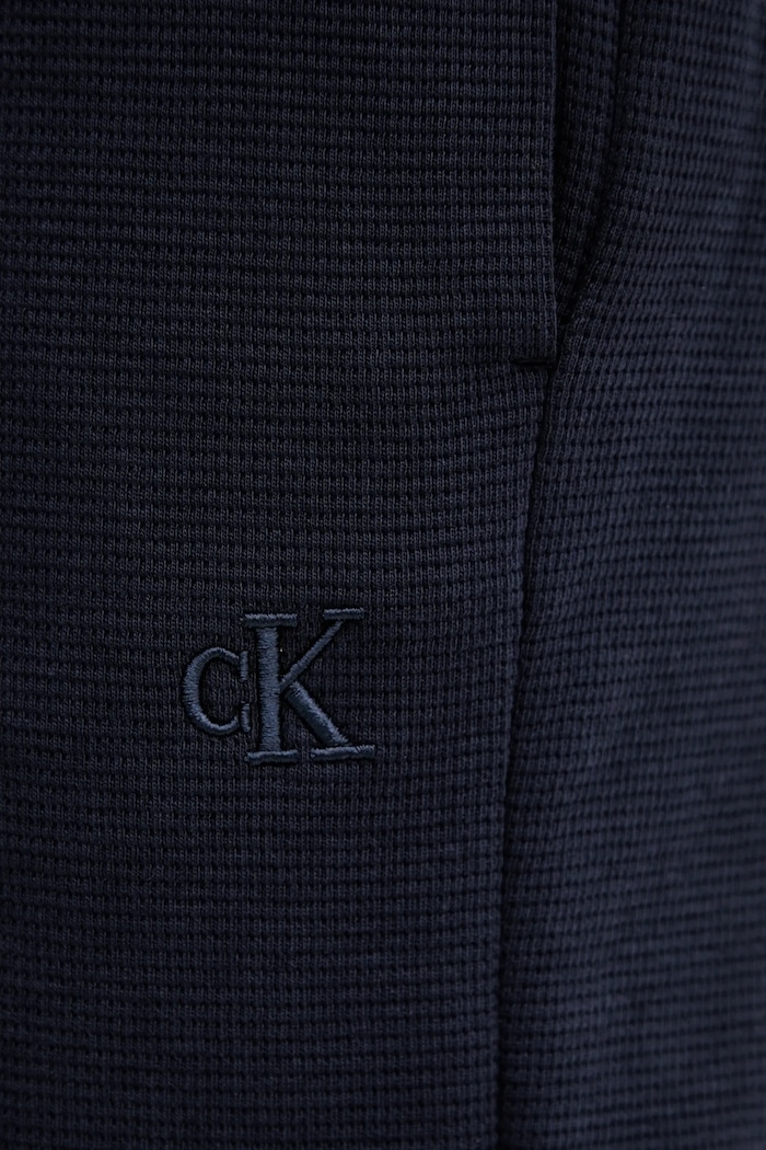 Calvin Klein Jeans pantaloni scurți de trening bărbați din bumbac bleumarin LV04RC248G