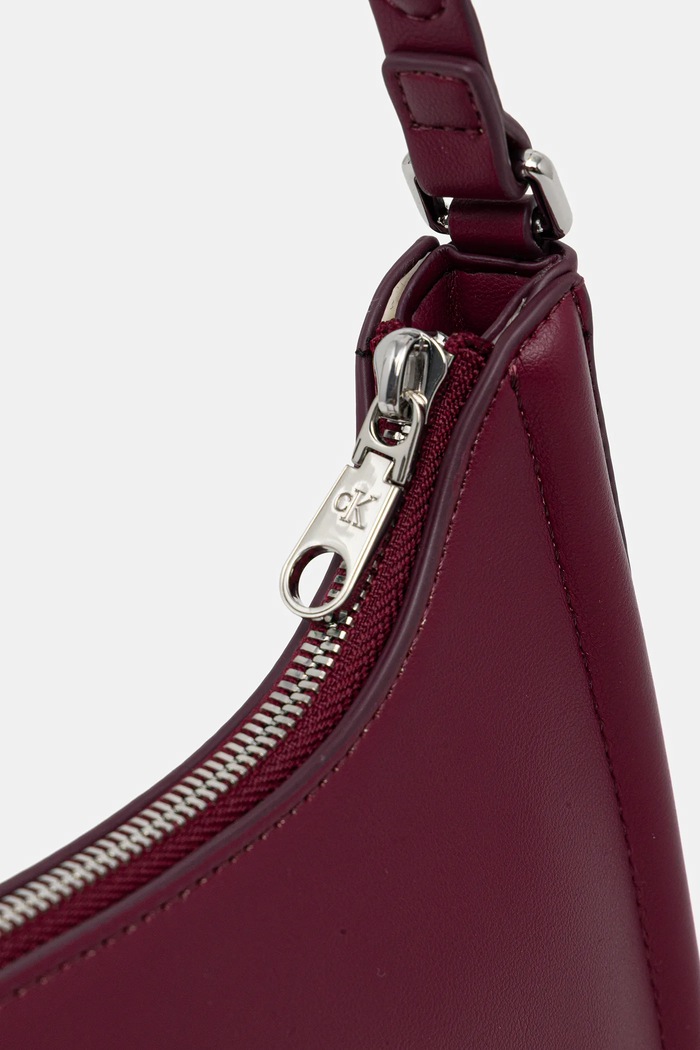 Calvin Klein baguette torbica ženska iz umetnega usnja bordo LV04F3230G
