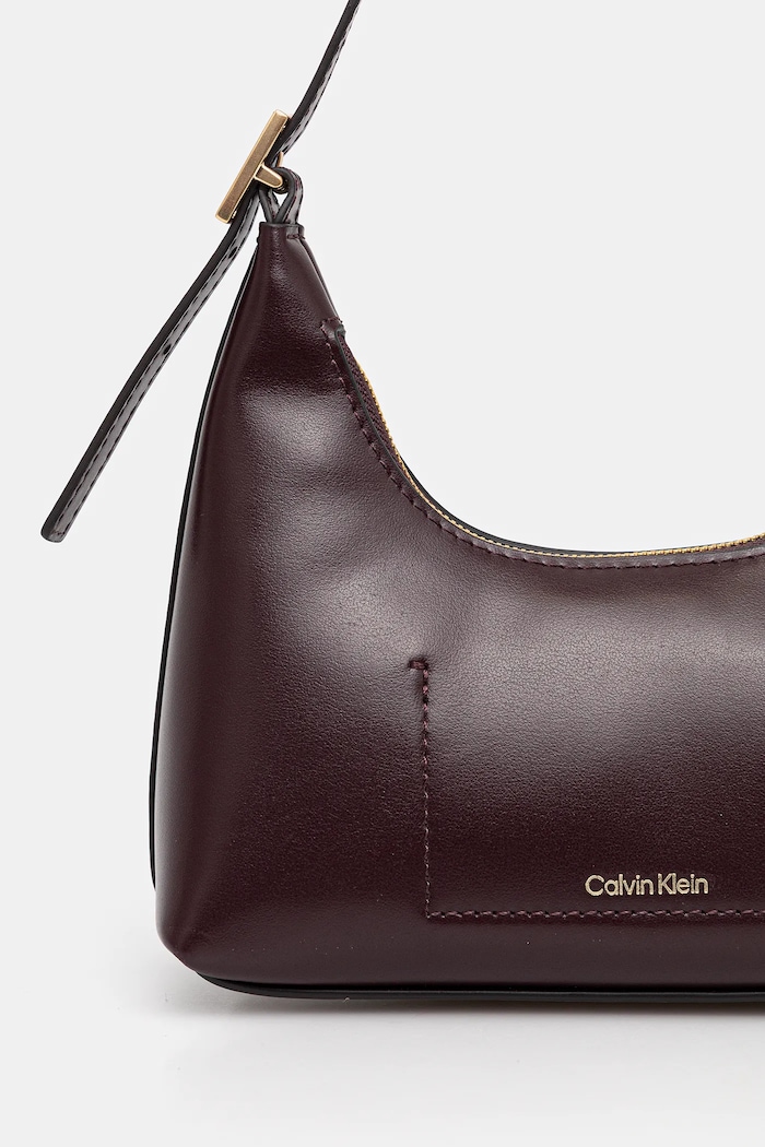 Akcesoria Calvin Klein torebka skórzana LV04F3263G fioletowy