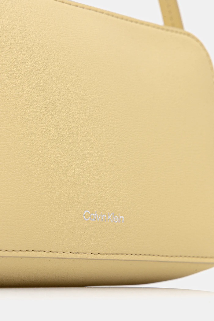 Calvin Klein crossbody torbica ženska iz umetnega usnja rumena LV04F3276G