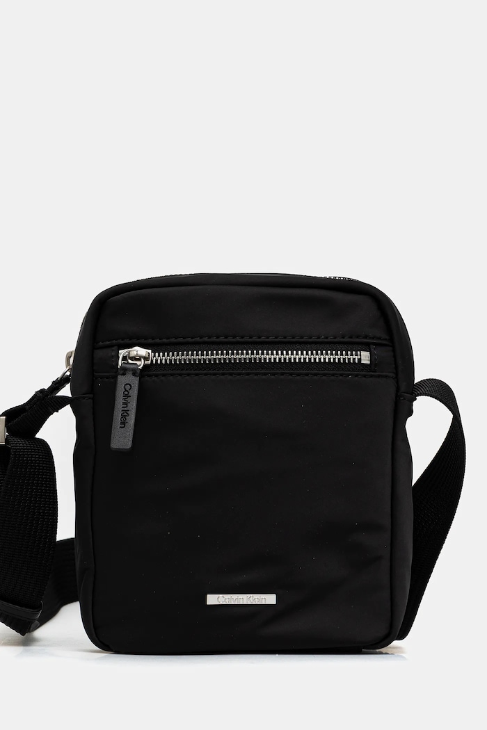 Calvin Klein saszetka nie mieści A4 czarny LV04D3176G