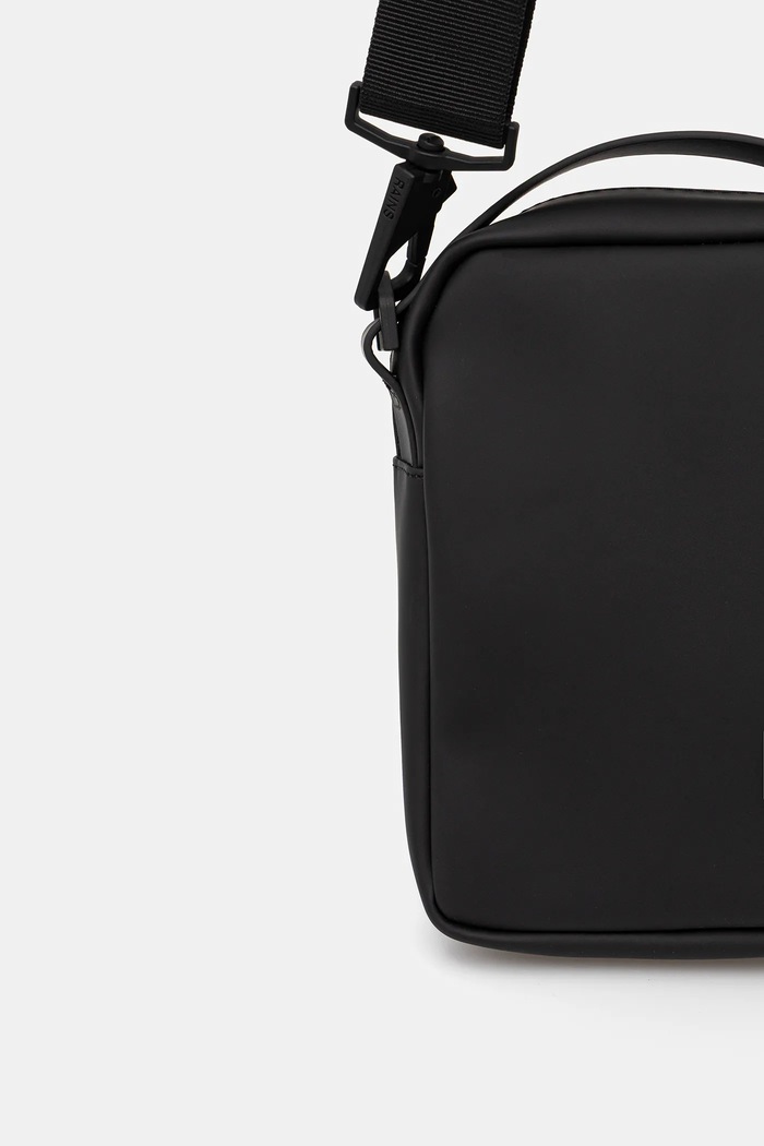 Doplnky Malá taška Rains 14920 Reporter Box Bag 14920. čierna
