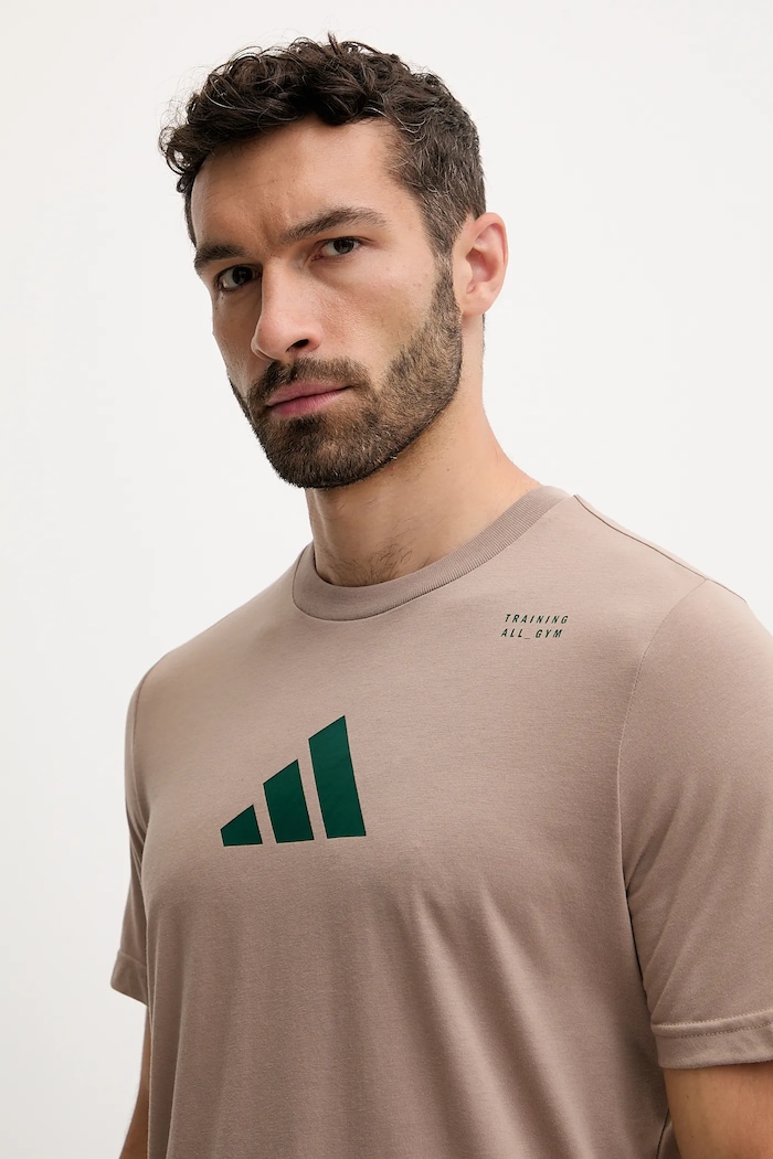 T-shirt treningowy Category Training Graphic adidas Performance JM8977 brązowy