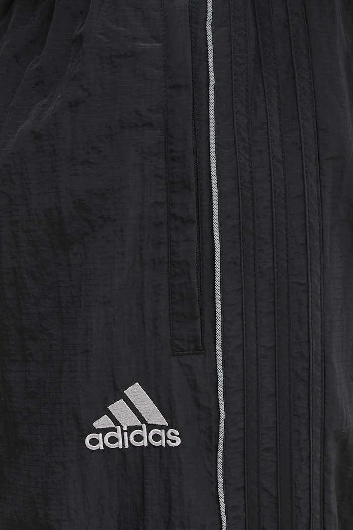 Tepláky adidas Originals Adilenium Tg Tp černá KF8521