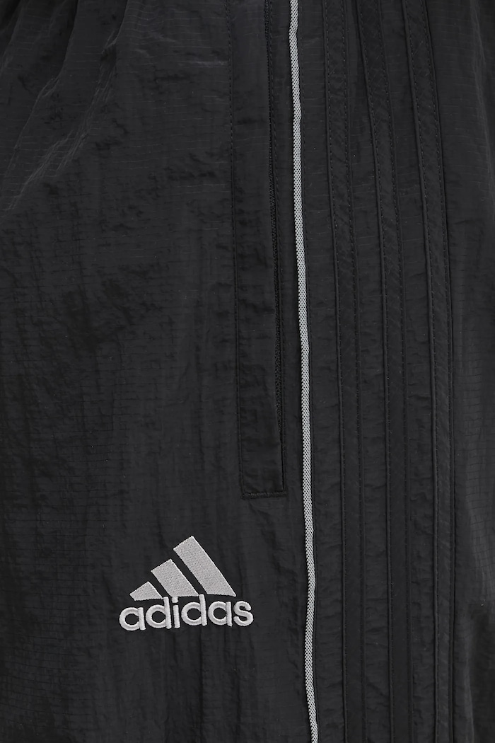 Tepláky adidas Originals Adilenium Tg Tp černá KF8521