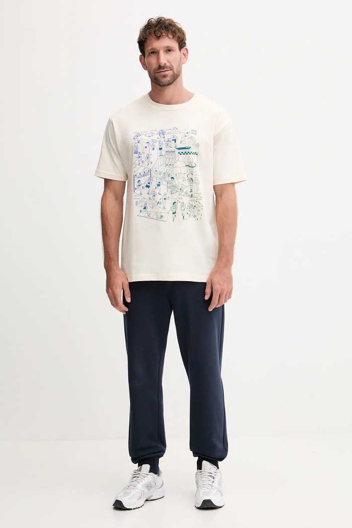 New Balance T-shirt bawełniany MT53916PEF beżowy AW25