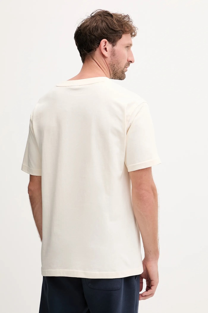 Odzież New Balance T-shirt bawełniany MT53916PEF beżowy