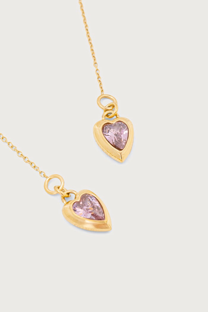 Guess Kolczyki damskie ze stali nierdzewnej z cyrkonią CRYSTAL LOVE JUBE06.364JW złoty AW26
