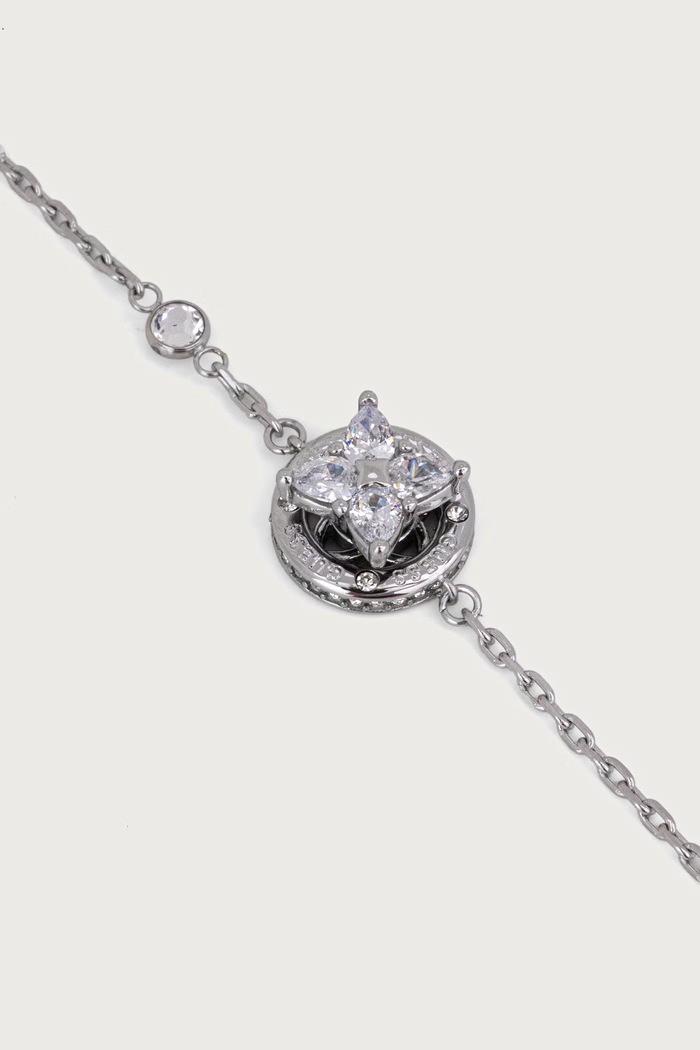 Guess Bransoletka damska ze stali nierdzewnej SPINNING BLOOM JUBB06.462JW srebrny AW26