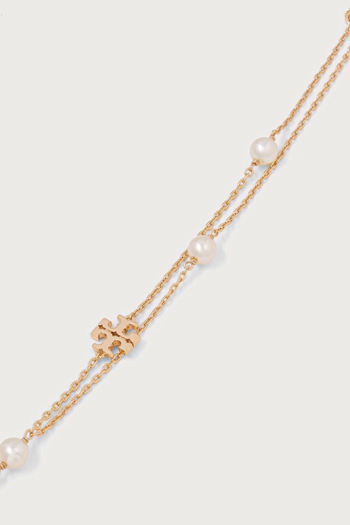Tory Burch Naszyjnik damski pozłacany Moondance 184437 złoty AW26