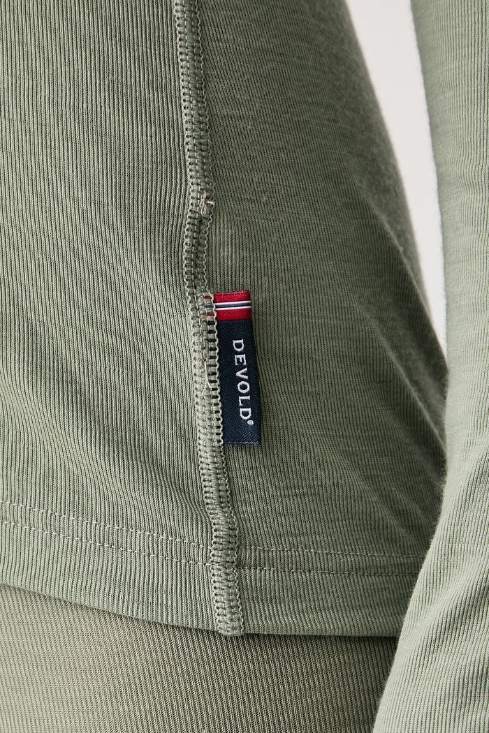 Longsleeve funkcyjny damski z wełny merino Adventure Merino Devold zielony PDGO.245.236.A
