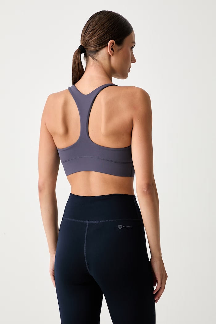 Odzież Puma biustonosz sportowy Shapeluxe 529067 fioletowy