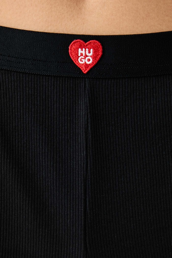 Oblačila HUGO Kratek spodnji del pižame ženski modalni HUGO HEART SHORTS 50566638 črna