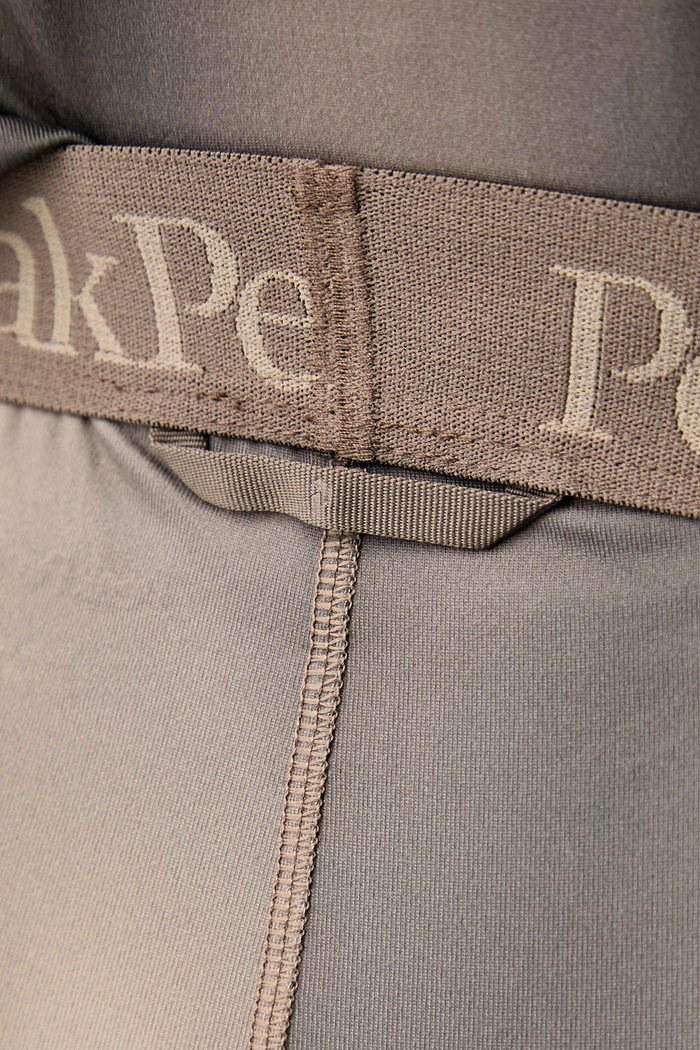 Legginsy termoaktywne męskie Peak Performance G80590020 brązowy