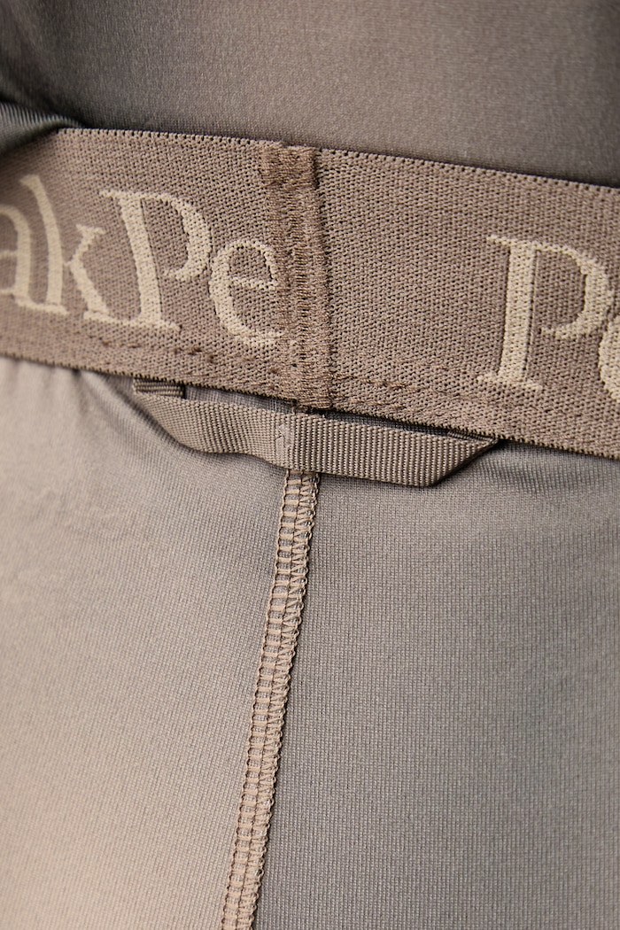Legginsy termoaktywne męskie Peak Performance G80590020 brązowy