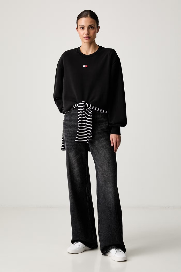 Tommy Jeans pulover ženski z bombažem DW0DW23297 črna AW26