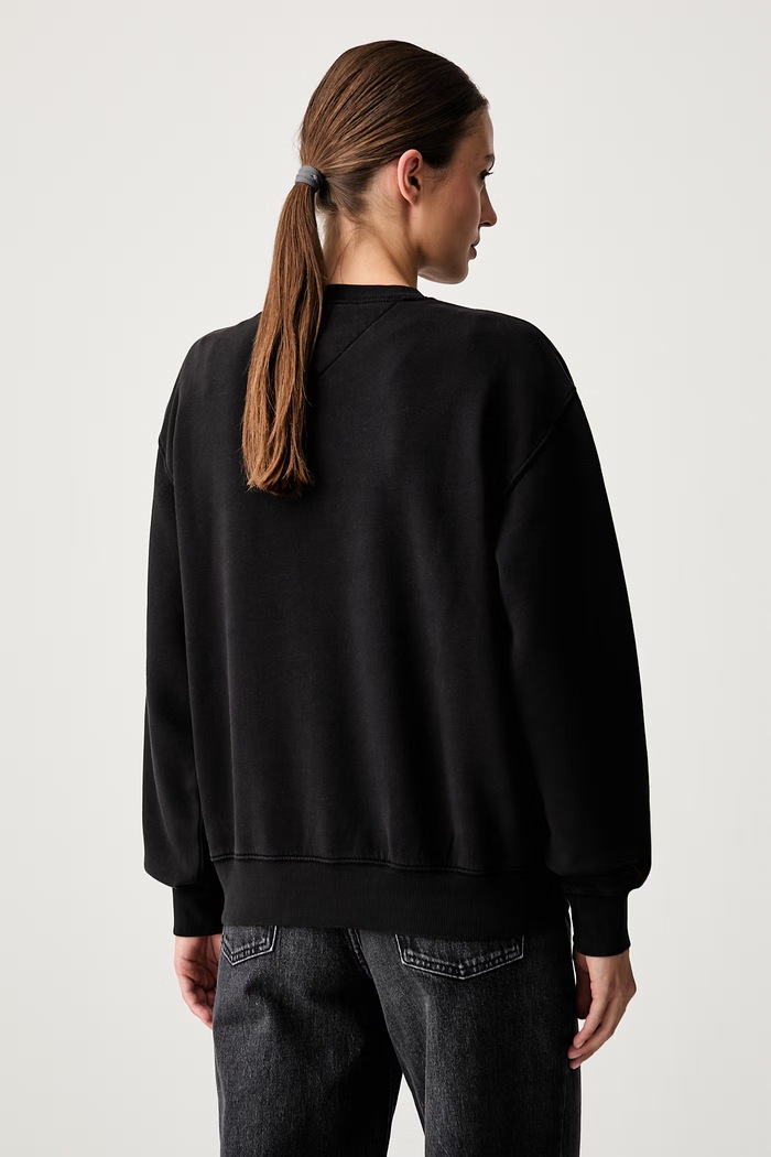 Oblačila Tommy Jeans pulover ženski z bombažem DW0DW23297 črna
