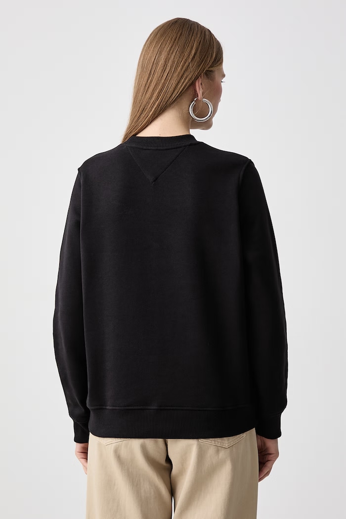 Ρούχα Tommy Jeans Μπλούζα γυναικεία βαμβακερή DW0DW23403 μαύρο