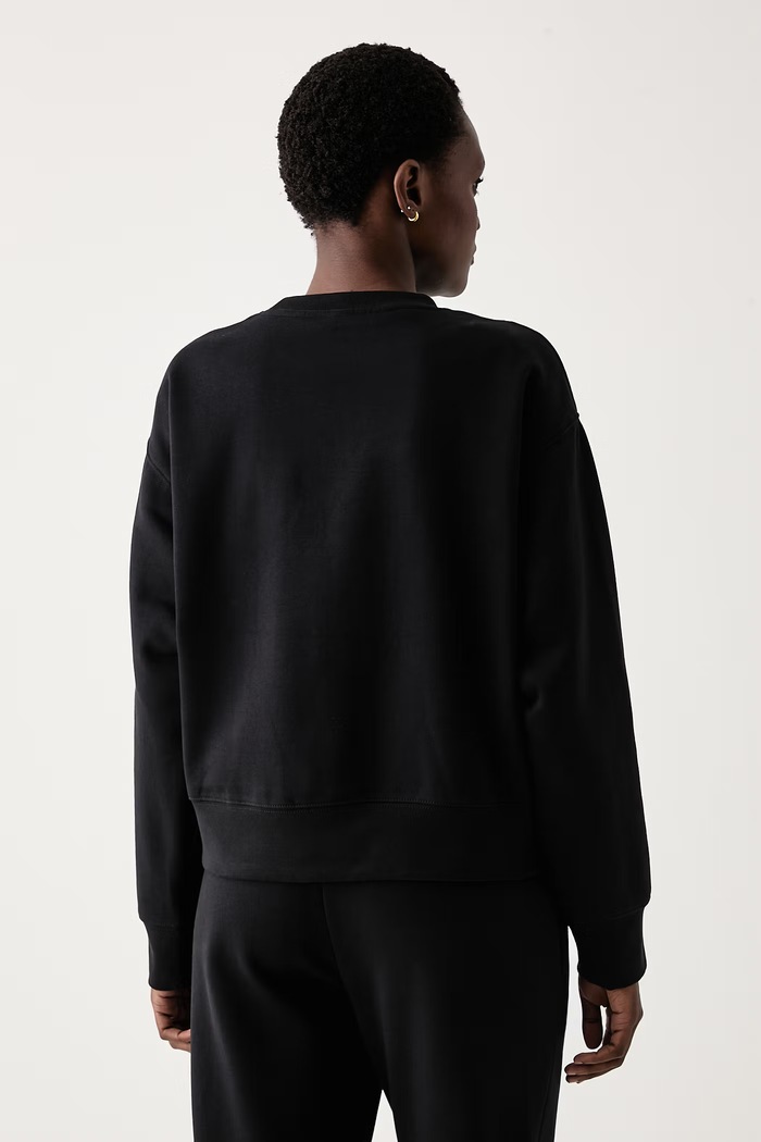 Oblačila The North Face Oversize pulover ženski z bombažem Essential NF0A8HBYJK31 črna