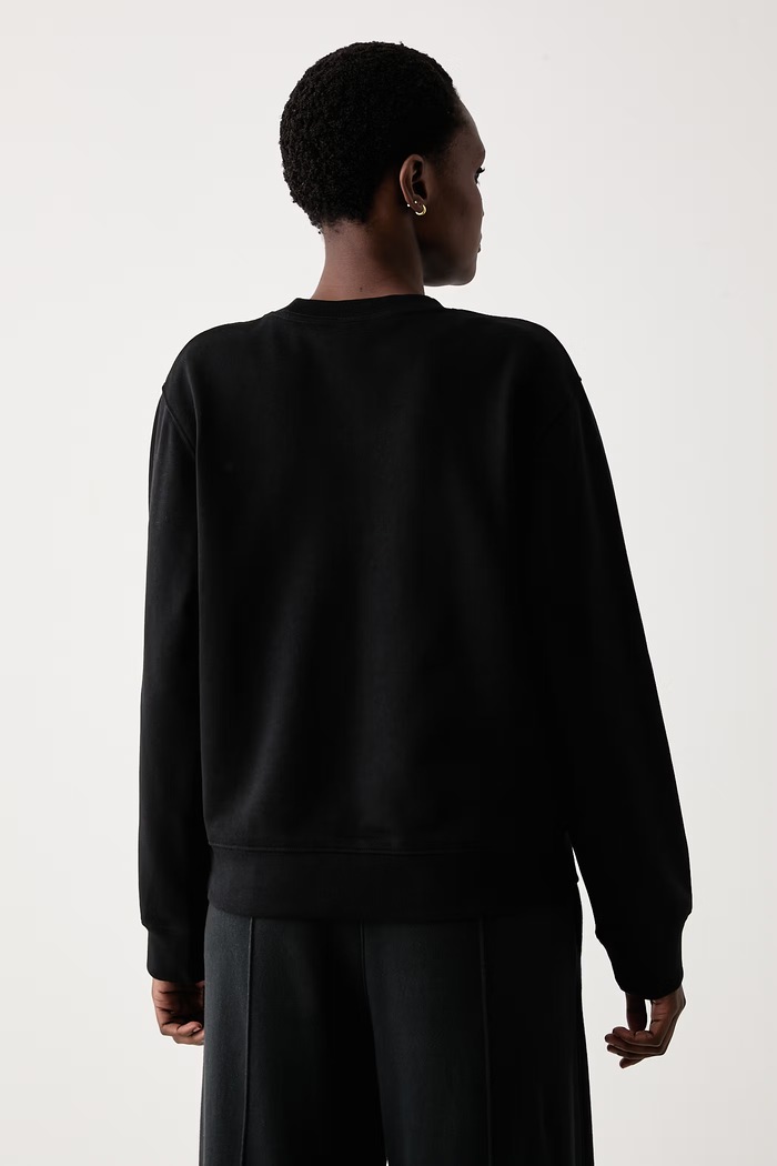 Ρούχα The North Face Μπλούζα γυναικεία με βαμβάκι Essential NF0A8FXDJK31 μαύρο